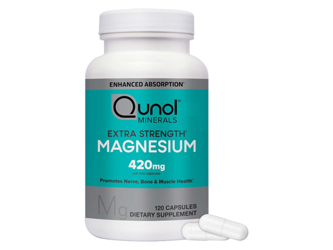Qunol Extra Strength Magnesium supplement bottle with a white capsule on a white background