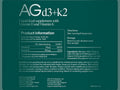 A dark teal product information card for AGd3+k2 liquid food supplement, showing serving size, daily intake, storage instructions, ingredients, and contact details.