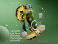 A green AG1 beverage can and matching tube floating with pineapple slices and ice cubes against a green gradient background. Text reads 'TASTING NOTES' and 'A smooth, light flavor with hints of pineapple and vanilla.