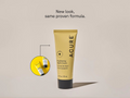 Acure skincare tube on a beige background with text 'New look, same proven formula'.