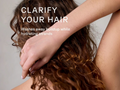 Person with curly hair being styled, with text 'Clarify Your Hair' and description.