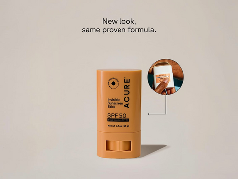 Acure Invisible Sunscreen Stick SPF 50 on a beige background with text 'New look, same proven formula.'