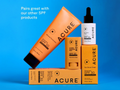 Acure SPF products including a sunscreen stick, bottle, and boxes on a blue background.