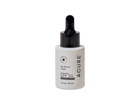 Acure Sun Serum Drops bottle with dropper on a white background