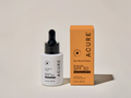 Acure Sun Serum Drops SPF 30 bottle and packaging on a light background