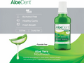 AloeDent aloe vera mouthwash bottle with product features on a green and gray background
