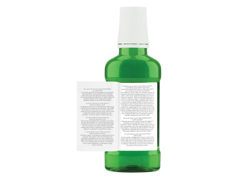 Green bottle with a white label on a white background
