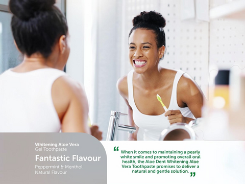 Woman brushing her teeth in front of a mirror with promotional text about Aloe Vera toothpaste.