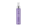 Purple spray bottle with silver nozzle on a white background