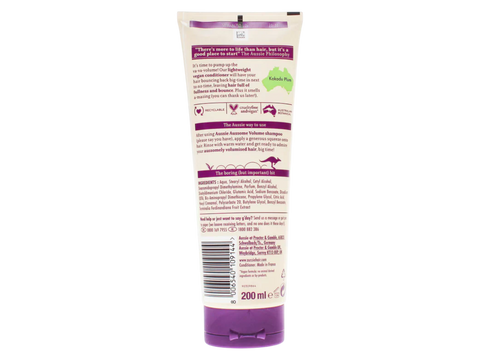 Back view of a tube of shampoo with text and branding on a white background