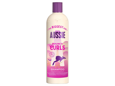 Aussie Bouncy Curls shampoo bottle on a white background
