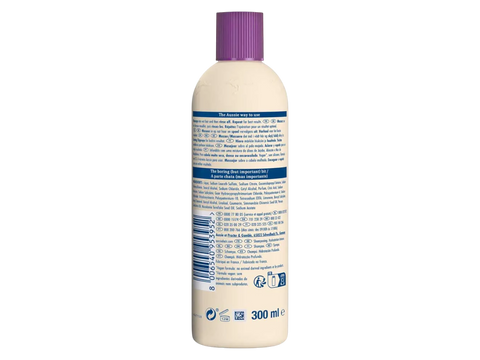Bottle with a purple cap and label on a white background