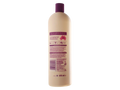 Bottle of hair care product with label on a white background