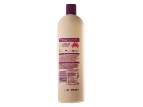 Bottle of hair care product with label on a white background