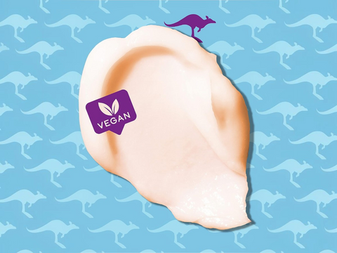 Illustration of an ear with a 'Vegan' sticker on it, set against a blue background with kangaroo patterns.