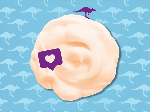 Purple heart icon on a beige swirl with kangaroo pattern in the background
