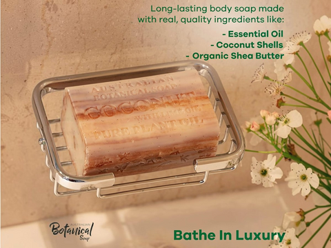 Bar of soap in a holder with decorative elements on a neutral background