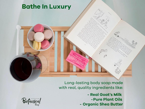 Relaxation scene with a book, macarons, and a mug on a tray with 'Bathe In Luxury' text.