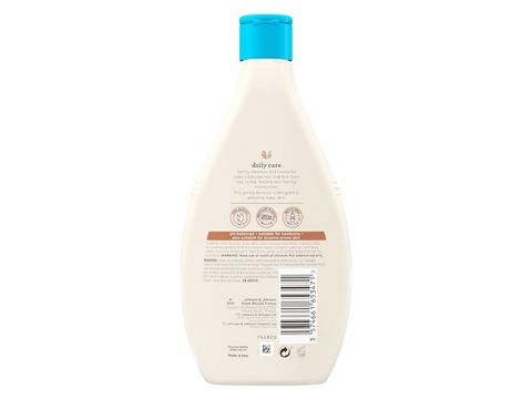 Back of Aveeno Baby Wash bottle showing ingredients, barcode and safety warnings.