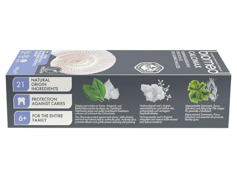 BIOMED Calcimax Mineral Toothpaste box, 100g, on a clean background.
