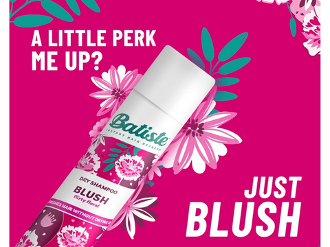 Batiste Dry Shampoo Blush bottle on a pink background with floral elements and text.