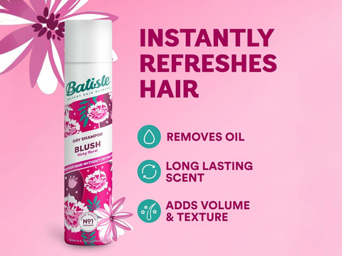 Batiste dry shampoo bottle with pink floral design on a pink background