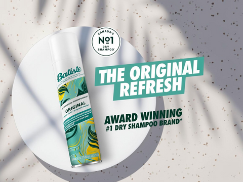 Baliste dry shampoo can with branding text on a textured gray background