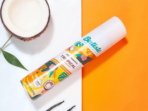 Lip balm with tropical design on a white and orange background