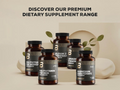 Collection of dietary supplement bottles with labels on a neutral background