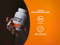 Pumpkin seed oil supplement bottle held by a hand with usage recommendations on an orange background