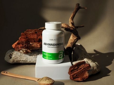 Supplement bottle labeled 'ASHWAGANDHA' on a neutral background with natural elements.