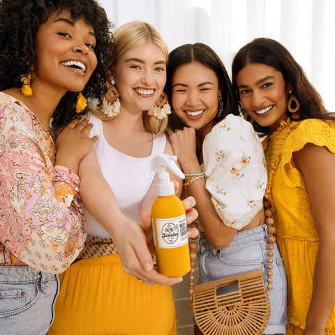 Lifestyle/use image: Sol de Janeiro Brazilian Joia leave in conditioner hair styling spray bottle Cheirosa 62 fragrance 210ml