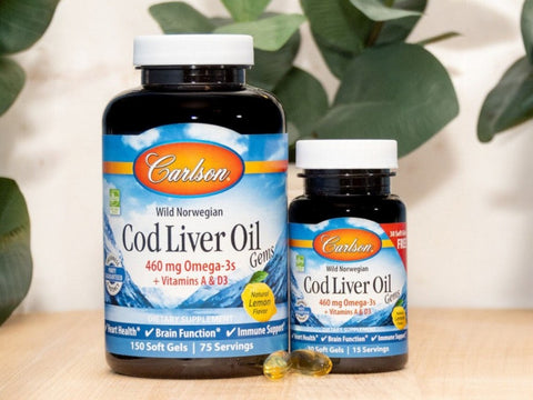 Carlson Labs Cod Liver Oil Gems 460 mg Omega-3s + Vitamins A & D3 180 Softgels close up of softgels next to bottle