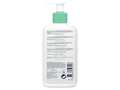 White bottle with green pump top on a white background