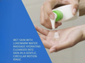 Hand applying a white cream to another hand with a blue text box and green cap.