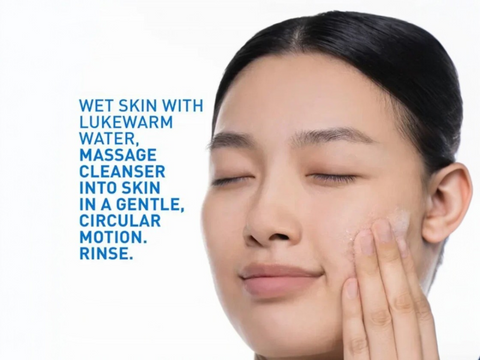 Woman applying cleanser to her face with text on a white background