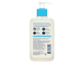 Bottle of cleanser with pump and label on a white background