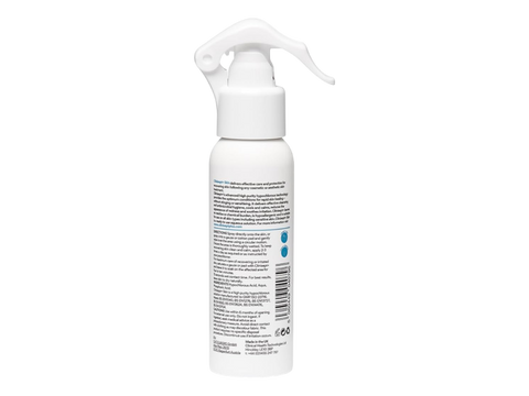 White spray bottle with label on a white background