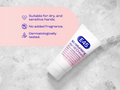 E45 moisturizing hand cream on a textured surface with product features listed.