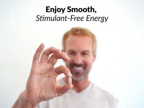 Hand holding a pill with text 'Enjoy Smooth, Stimulant-Free Energy' on a white background