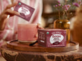 How to Use: Four Sigmatic Elixir packet contents being poured into a mug.