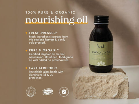 Fushi Organic Avocado Oil 100 ml bottle on brown background with label close up