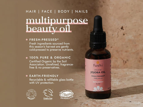 Fushi Organic Jojoba Oil 30 ml bottle on brown background with label close up