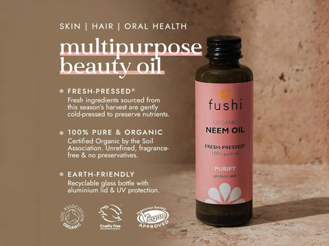 Fushi Organic Neem Oil 50 ml bottle on brown background with label close up