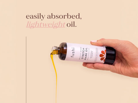 Fushi Really Good Stretch Mark Oil 100 ml oil being applied to skin during massage