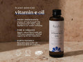 Fushi Really Good Vitamin E Oil 50 ml bottle on brown background with label close up
