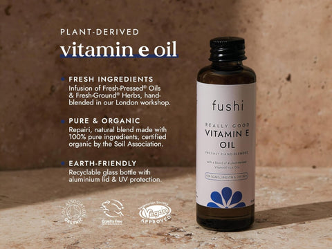 Fushi Really Good Vitamin E Oil 50 ml bottle on brown background with label close up