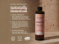 Fushi Wild Grown Carrot Oil 100 ml bottle on brown background with label close up
