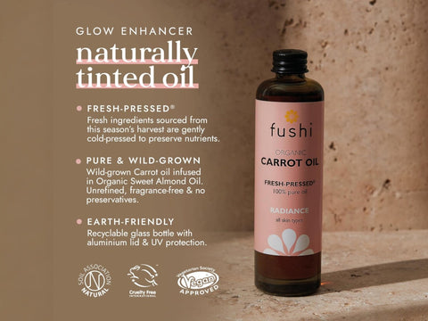 Fushi Wild Grown Carrot Oil 100 ml bottle on brown background with label close up