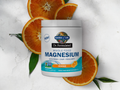 Garden of Life Dr. Formulated Whole Food Magnesium Orange 197.4g front tub packaging showing product name and branding